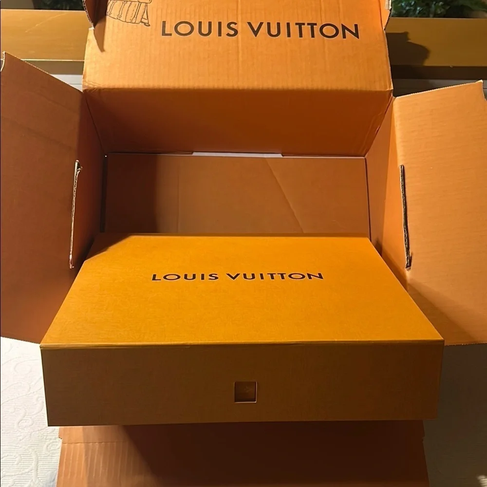 Louis Vuitton Signature  Box inside a LV shipping box with tissue and ribbon.